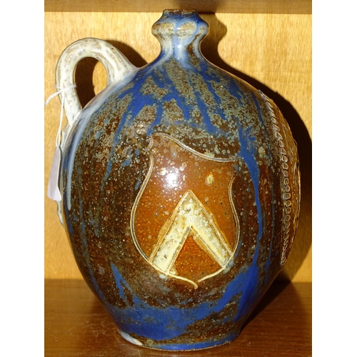 123 - A German salt-glazed baluster wine flagon with state coat of arms, on blue, brown and white mottled ... 