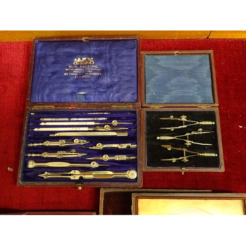 134 - A set of drawing instruments by W H Harking, a smaller set and two daguerreotypes, (4).... 