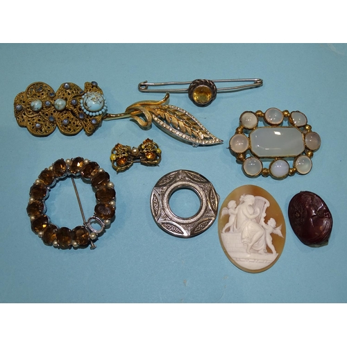 195 - A silver bar brooch set citrine, a chalcedony set brooch and other items.