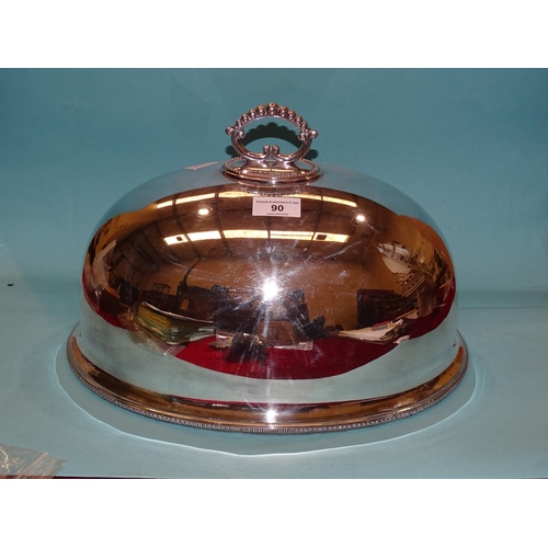 90 - A Walker & Hall silver plated domed meat dish cover 36.5cm long, 24.5cm high, engraved family cr... 