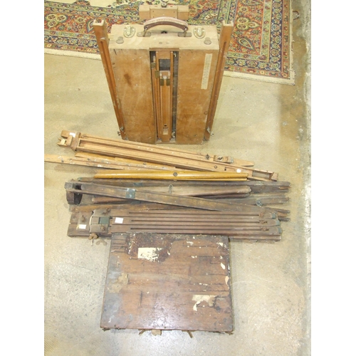 110 - A collection of artist's easels, a travelling easel and paint box and other artist's materials.... 