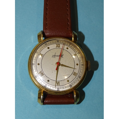 142 - A gent's vintage Accurist wrist watch, the two-tone silvered dial with applied dot and Roman numeral... 