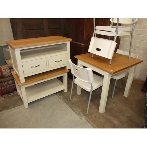 4 - An oak and painted extending dining table, low cupboard and coffee table, with four Ikea chairs.... 