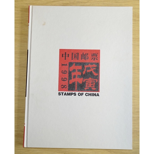 91 - A collection of modern giftware Chinese commemorative coins and stamps, together with a Mao Tse Tung... 