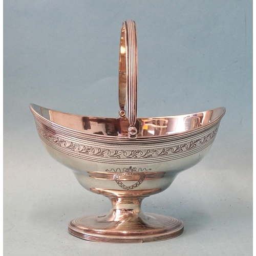 331 - WITHDRAWNA George III silver sweetmeat basket by George Burrows, of navette shape with swing handle,... 