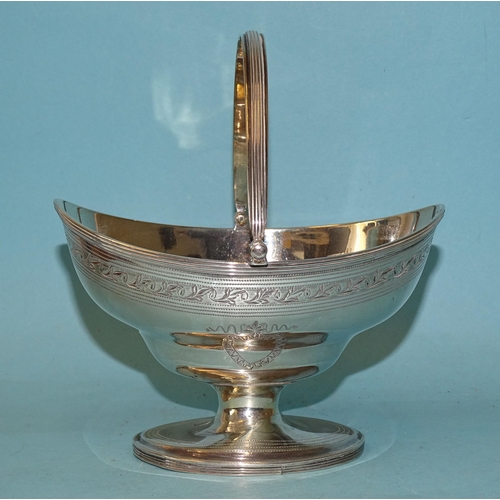 331 - WITHDRAWNA George III silver sweetmeat basket by George Burrows, of navette shape with swing handle,... 