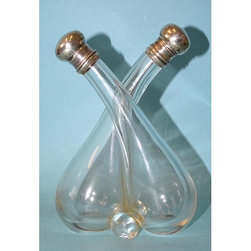 332 - A pair of silver-topped glass oil and vinegar bottles, London 1923, 15.5cm high.