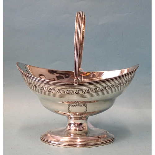 335 - A George III silver sweetmeat basket by George Burrows, of oval form with ribbed swing handle, raise... 