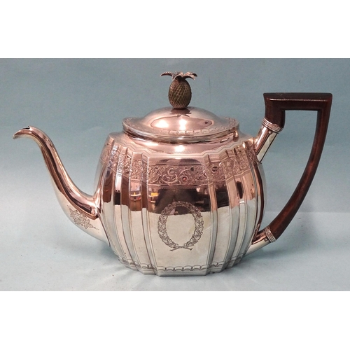 336 - A George III silver teapot on stand, of oval fluted form with engraved decoration and pineapple fini... 