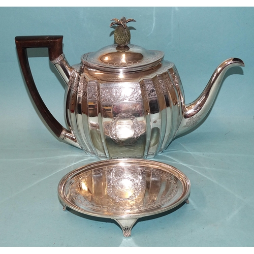 336 - A George III silver teapot on stand, of oval fluted form with engraved decoration and pineapple fini... 