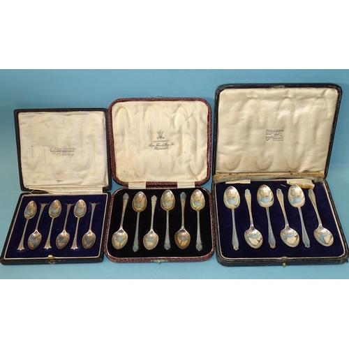 339 - A cased set of silver coffee spoons, London 1928 and two cased sets of teaspoons, (both John Deakin ... 