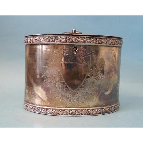 346 - A silver tea caddy of oval form with engraved decoration, chased rims and hinged lid, E Baker & ... 