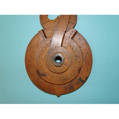 63 - An early-18th century rare boxwood or fruitwood nocturnal, the brass centre pivot with rotating volv... 