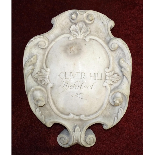 80 - A white marble scroll-form cartouche inscribed Oliver Hill Architect, 43cm x 34cm. Oliver Hill (1887... 