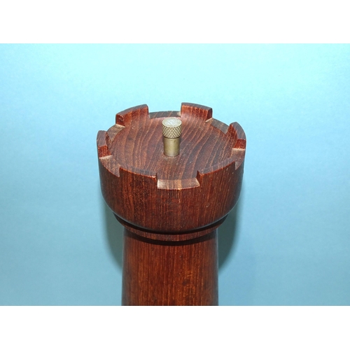 65 - In the style of Jens Harald Quistgaard, a mid-20th century teak chess castle/rook large pepper mill ... 