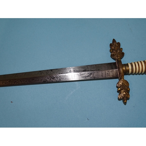 69 - A Georgian naval officer's dirk, the 27cm etched blade marked 