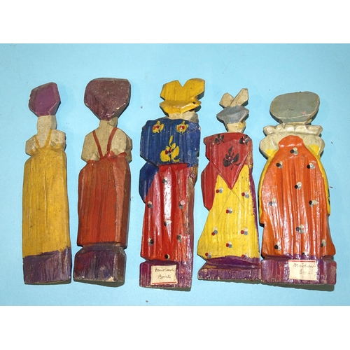 79 - A collection of Russian artisan carved wood toys, both figural and mechanical.