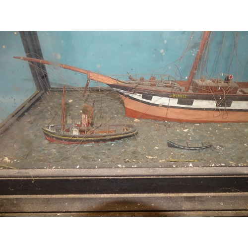 66 - An antique waterline diorama model of the three-masted top-sail schooner 'Minnie', 68cm long, accomp... 