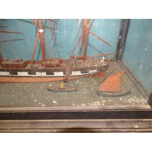 66 - An antique waterline diorama model of the three-masted top-sail schooner 'Minnie', 68cm long, accomp... 