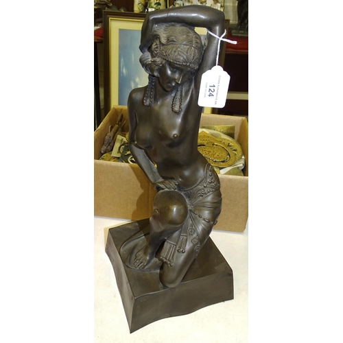 124 - Unsigned, a contemporary bronzed cold-cast resin sculpture of a semi-naked female figure, kneeling o... 