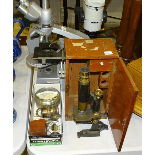 136 - A Wild Heerbrugg binocular microscope, a Reichert binocular microscope, (both a/f), a microscope mar... 