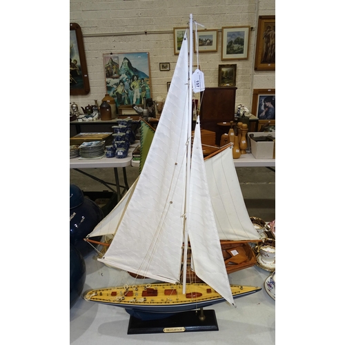 157 - A mid-20th century wooden table lamp in the form of a sailing boat, 46cm wide, 58cm high, two modern... 