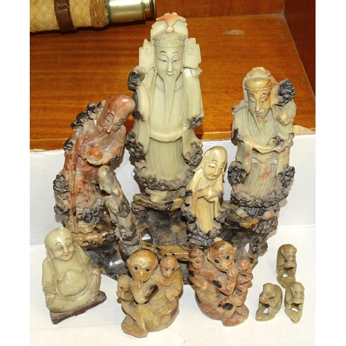 188 - A collection of various Oriental carved soapstone figures and monkeys.