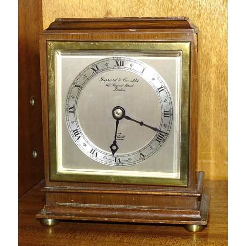 204 - A small mahogany case Elliott mantel timepiece, the dial with Roman numerals, marked Garrard & C... 