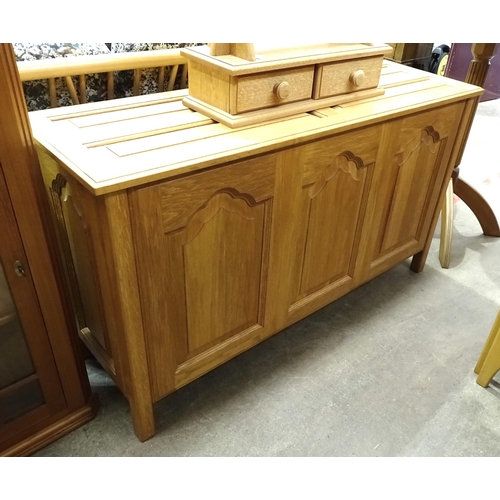 27 - A craftsman-made oak blanket box with hinged lid, 124cm wide, 70cm high, 39.5cm deep.... 