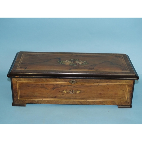 163 - A 19th century rosewood and ebonised Swiss musical box, playing twelve airs, on 21cm brass cylinder,... 