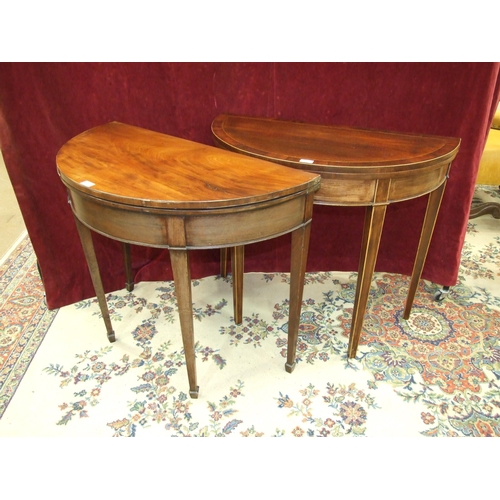 81 - An inlaid mahogany half-round fold-over card table, 90cm wide, a fold-over tea table, both on square... 