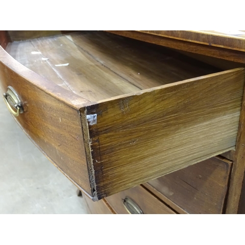 82 - A 19th century bow-fronted chest of four cockbeaded drawers, on splayed bracket feet, 99cm wide, 96c... 