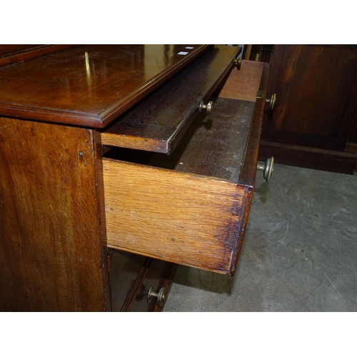 85 - A 19th century mahogany chest of three graduated drawers beneath a brushing slide, 109cm wide, 82.5c... 