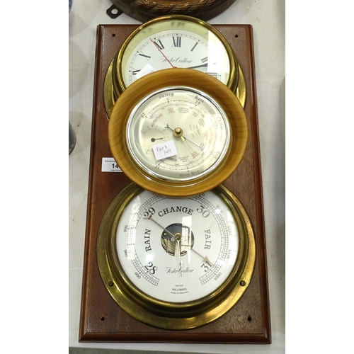 49 - An aneroid barometer in oak rope-twist surround, 26.5cm diameter overall, a Foster Callear brass shi... 