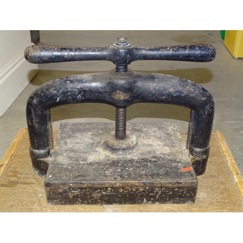 121 - A cast iron book press, 42cm wide, 35cm high, with name plaque John Smith, 102 Old Town Street, Plym... 