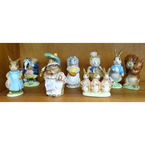 148 - Nine Beswick Beatrix Potter figures, all gold oval backstamp,Benjamin Bunny, Mrs Flopsy Bunny, Peter... 