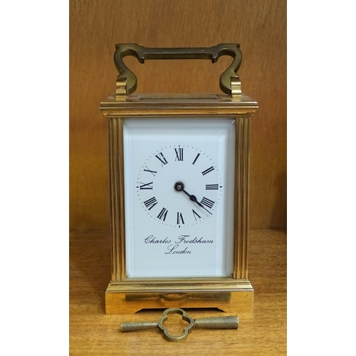 165 - A brass carriage timepiece, the dial marked Charles Frodsham, London, 15cm high overall.... 