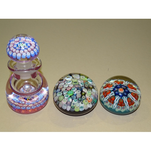 201 - Two Strathearn millefiori art glass paperweights and a millefiori glass scent bottle and stopper wit... 