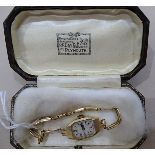 208 - A lady's 9ct-gold-cased wrist watch on 9ct gold bracelet, 12.3g, (boxed).