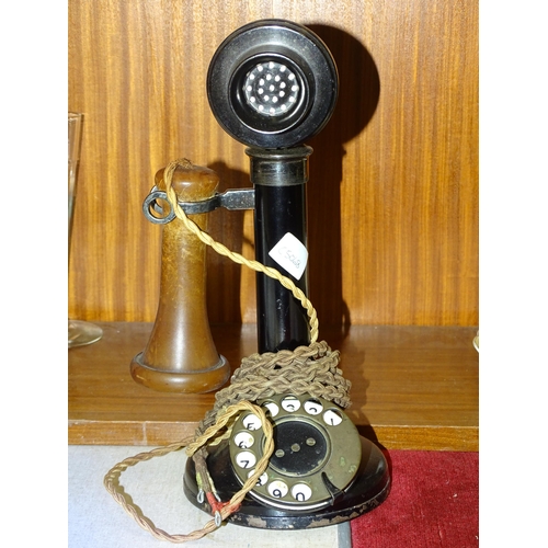 71 - A vintage candlestick telephone, 31cm high.