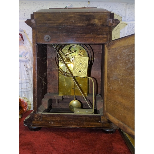 78 - A late 19th century mahogany mantel clock, the brass dial with Arabic numerals, chime/silent and slo... 