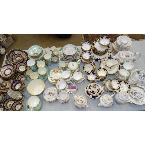 98 - A collection of 19th century English tea-ware decorated blue and gilt, approximately 25 pieces and o... 