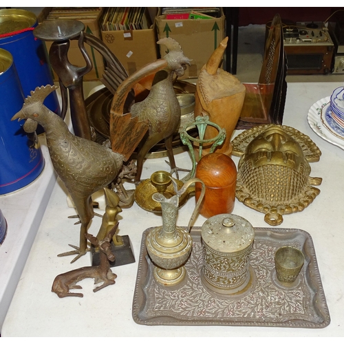 108 - A collection of mid-20th century Nigerian and other brass worked metal tourist items.... 