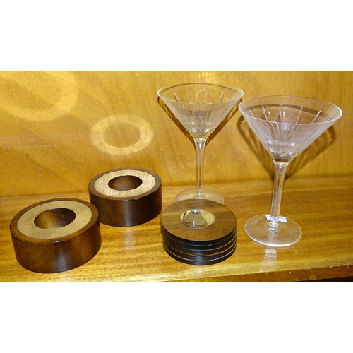 115 - A pair of Linley walnut and polished nickel tea light holders, 10cm diameter, 4cm high, five similar... 