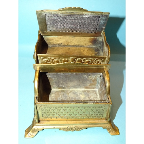 80 - Adolph Frankau & Co, a brass combined Vesta holder/ashtray with embossed decoration, the lid of ... 