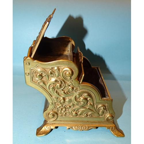 80 - Adolph Frankau & Co, a brass combined Vesta holder/ashtray with embossed decoration, the lid of ... 