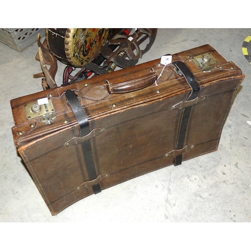 96 - A leather suitcase, 65 x 38cm, an inlaid wooden dome-top jewellery box, one other wooden box, a pair... 