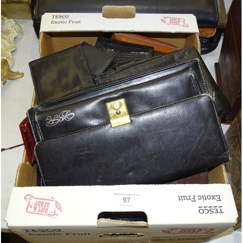 97 - A collection of leather document cases, wallets and other items.