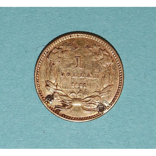 123 - An 1861 USA gold one-dollar, (solder marks).