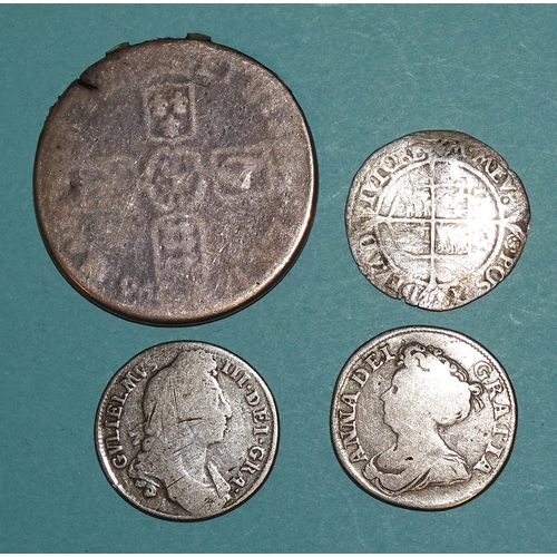 149 - An Elizabeth I 1565 hammered silver sixpence, a Queen Anne 1711 shilling, a William III 1696 crown, ... 